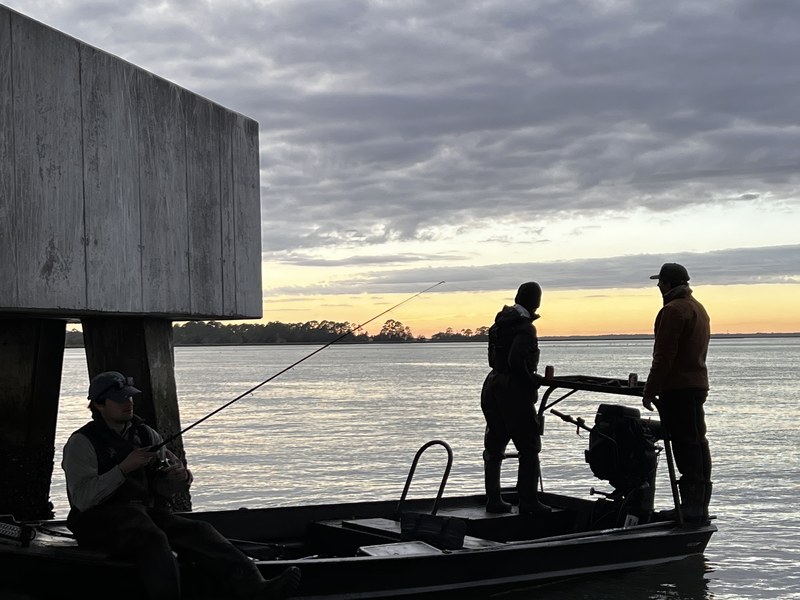 Lowcountry fishing boat at sunset on the Charleston waterway